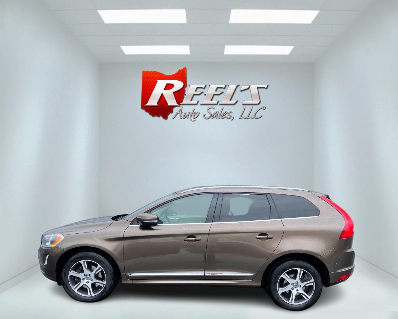 2015 Brown /Tan Volvo XC60 T6 Premium Plus (YV4902RC5F2) with an 3.0L I6 24V DOHC Turbo engine, 6-Speed Automatic transmission, located at 11115 Chardon Rd. , Chardon, OH, 44024, (440) 214-9705, 41.580246, -81.241943 - Photo#11